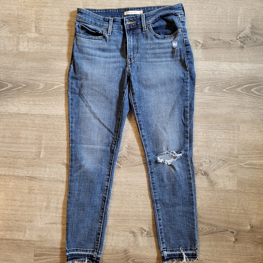 Distressed Blue Jeans